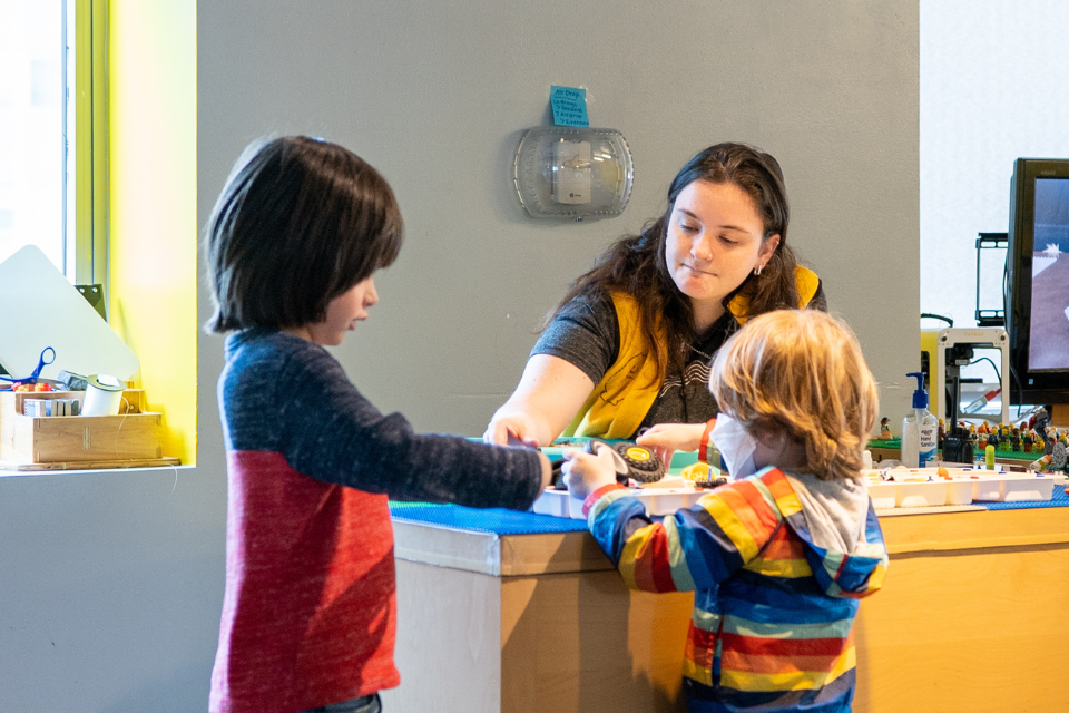 story1 Children engaging with educator in animation studio